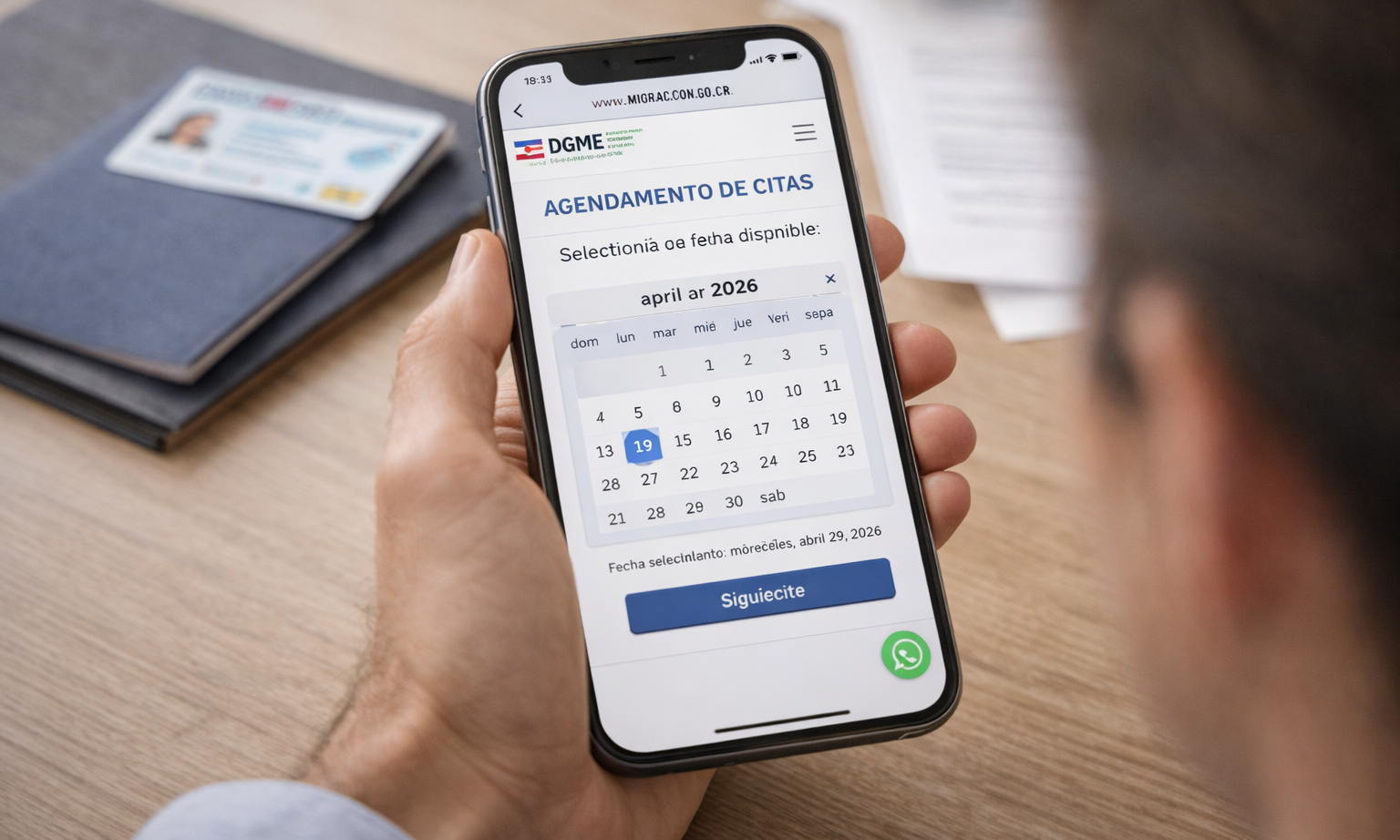 Person scheduling a Costa Rica immigration appointment on a smartphone, representing planning a DIMEX renewal appointment.