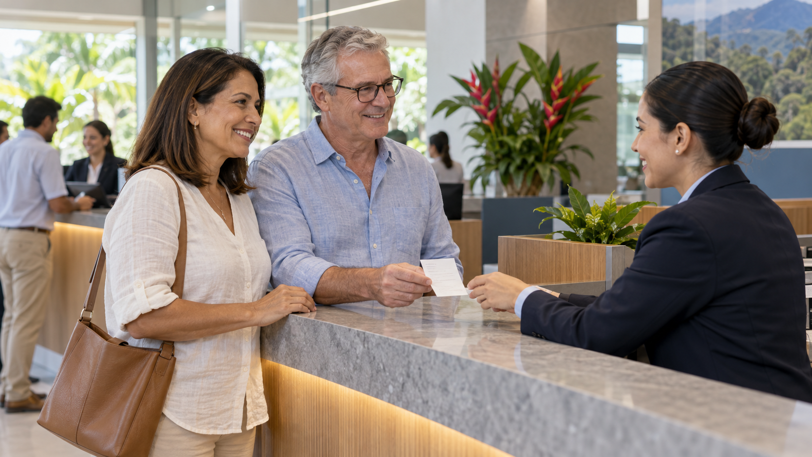 Couple completing a DIMEX renewal payment at a Costa Rica bank counter