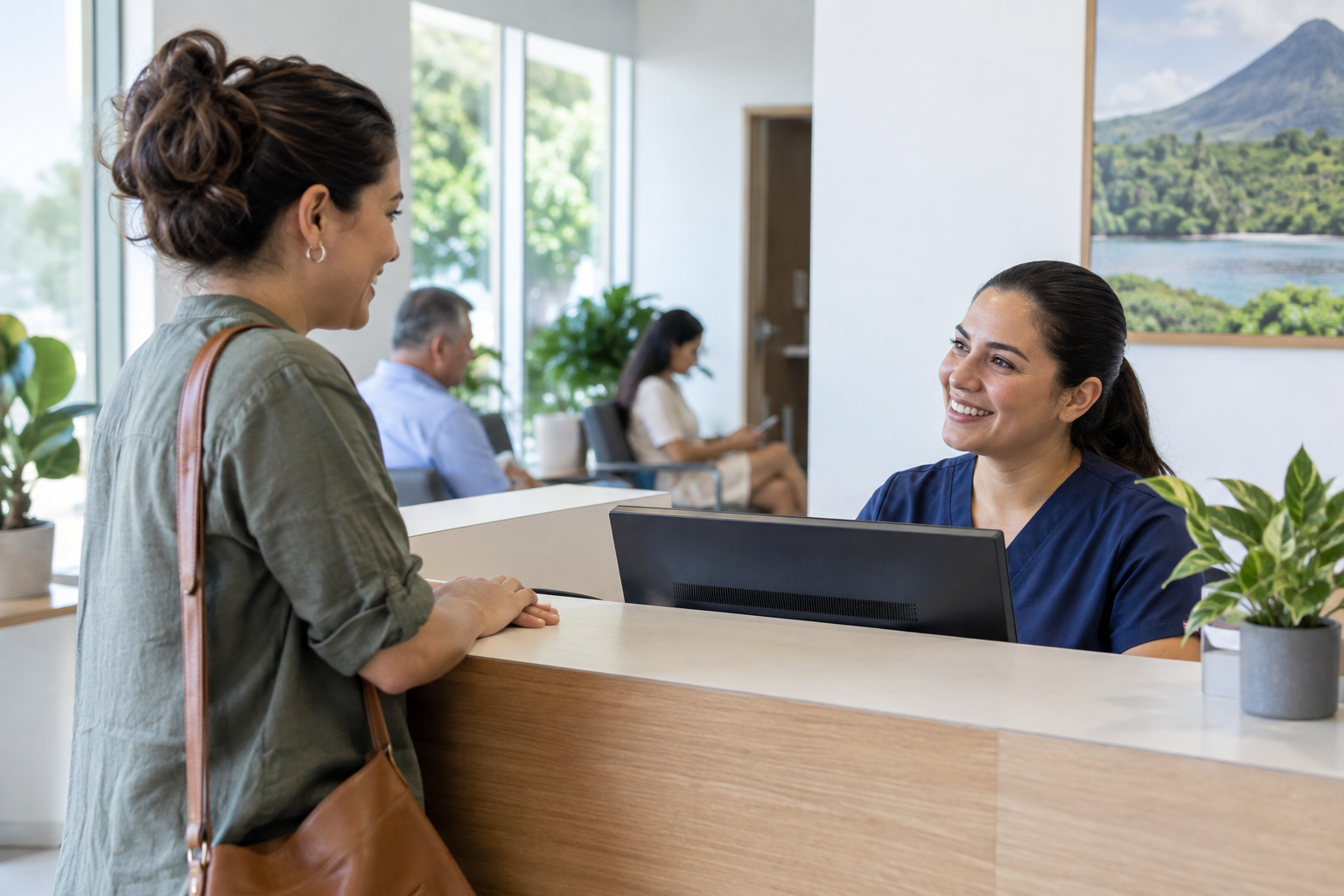 Patient speaking with a clinic receptionist in Costa Rica.
