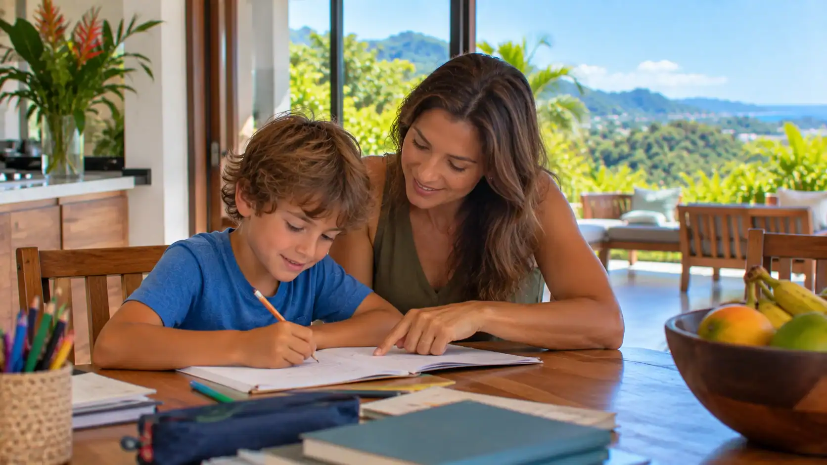 A mother helping her young child with homework at a kitchen table in Costa Rica