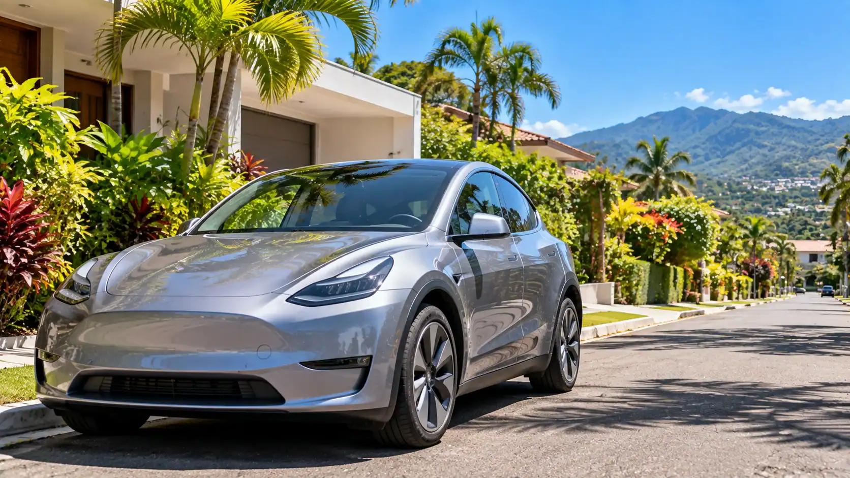 A used electric car parked on a sunny residential street in Costa Rica