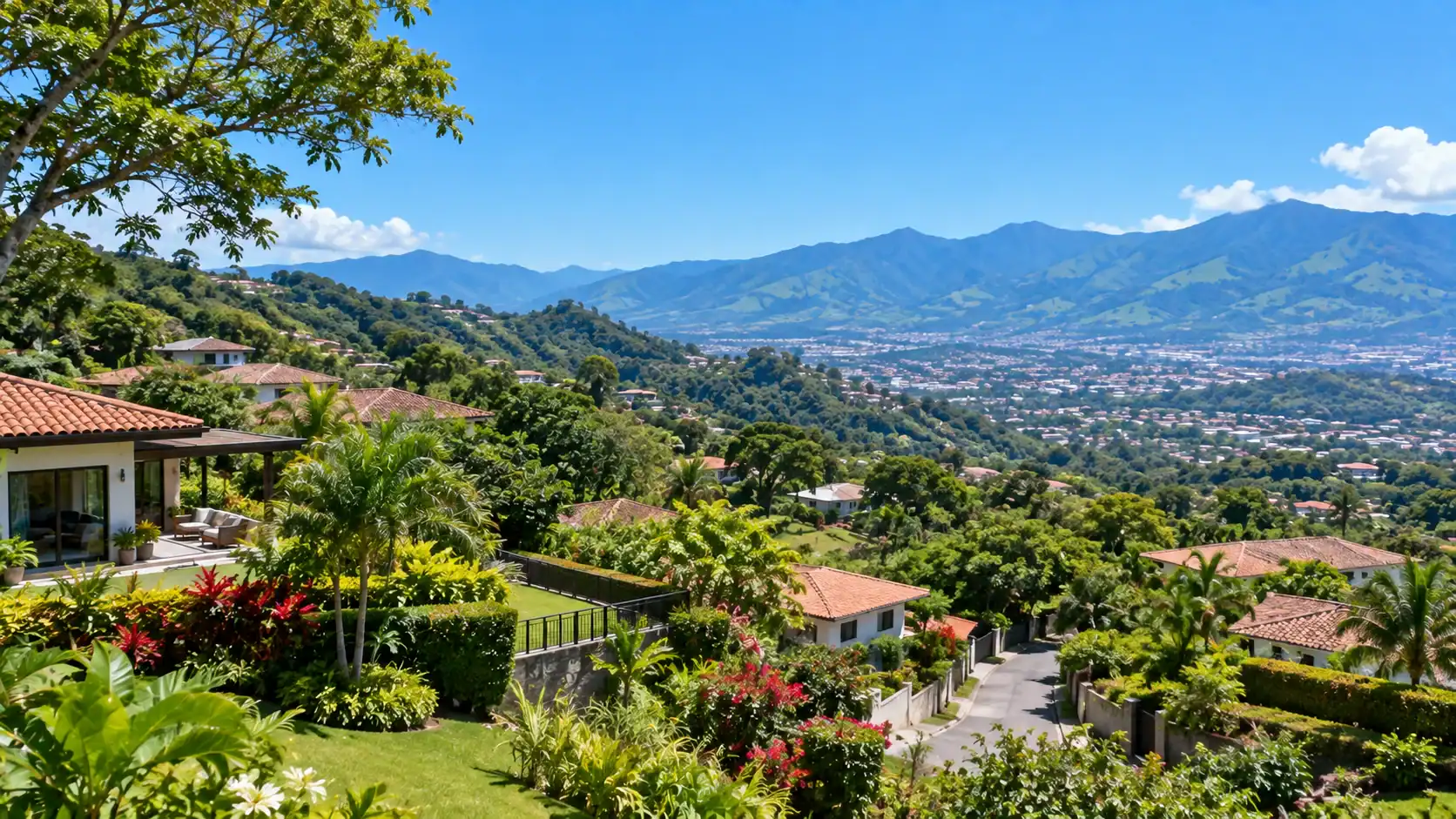 A view of a highland town with homes and green hills in Costa Rica