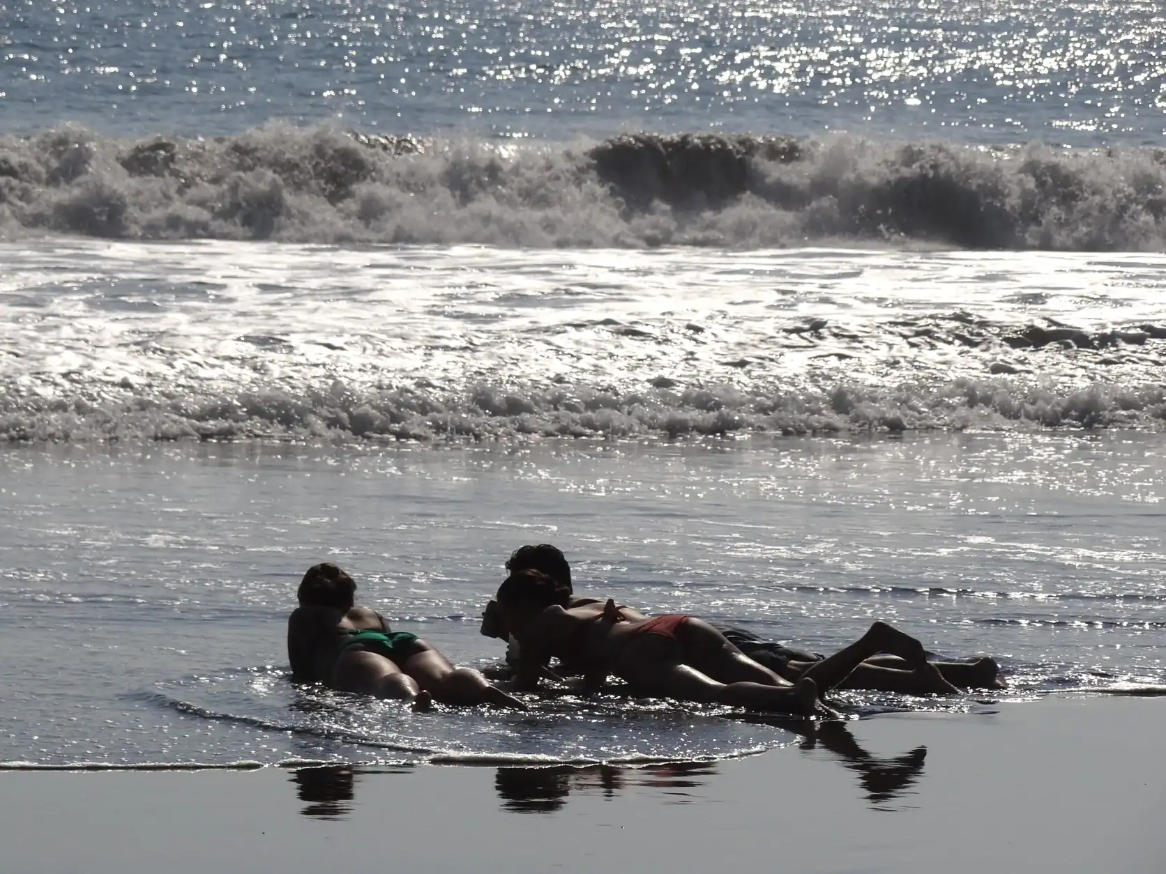 Surf rolling in at Playa Hermosa, near Jacó, Costa Rica